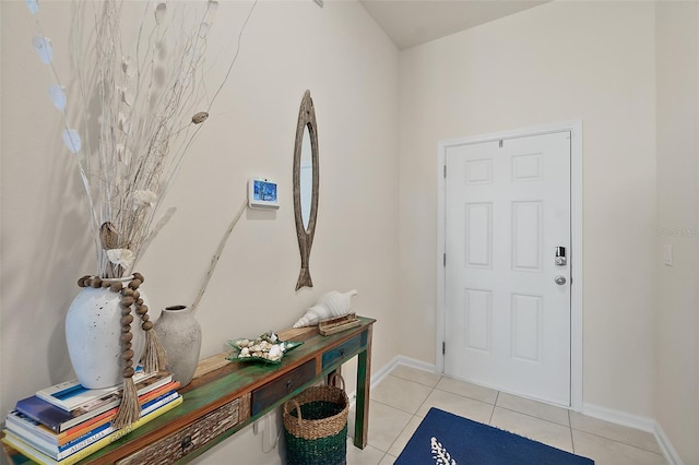 entryway featuring light tile patterned floors