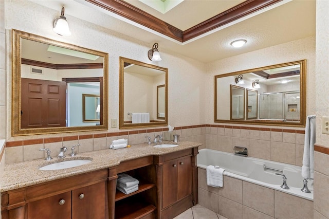 bathroom with vanity, separate shower and tub, a raised ceiling, and crown molding