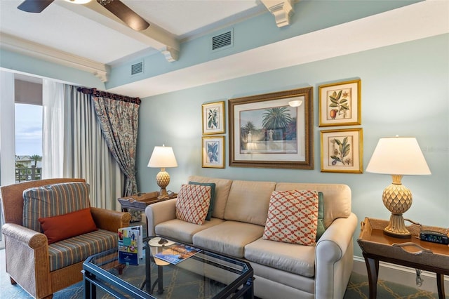 living room featuring ceiling fan and beam ceiling