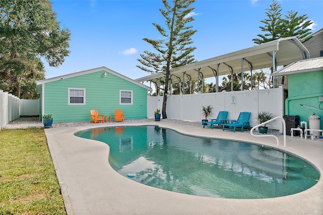 view of swimming pool with a patio area