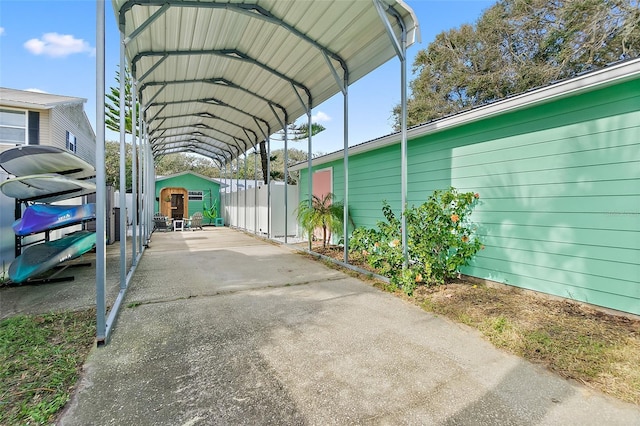 view of parking / parking lot with a carport