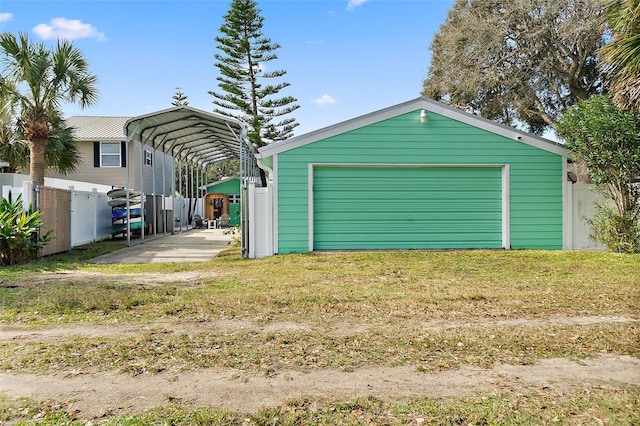 garage featuring a carport