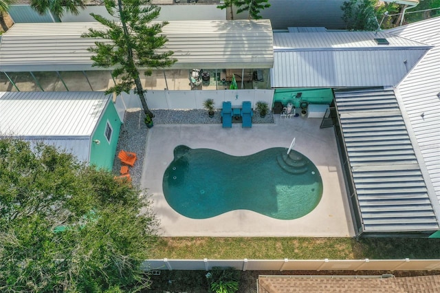 view of swimming pool with a patio