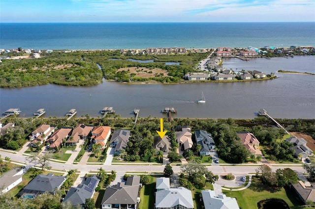 bird's eye view with a water view