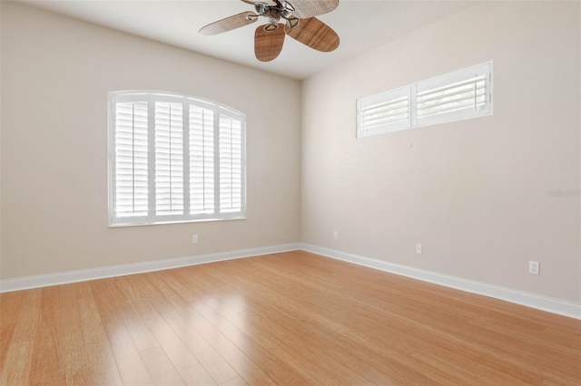 unfurnished room with ceiling fan and light hardwood / wood-style floors