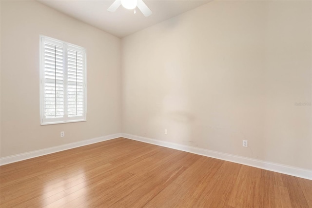 spare room with ceiling fan and light hardwood / wood-style floors