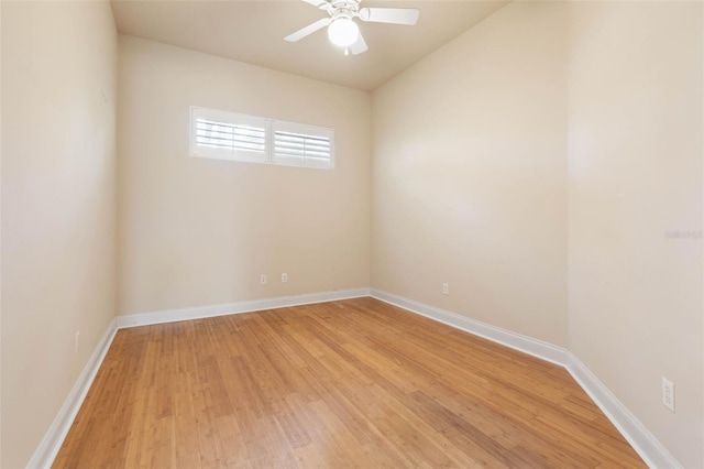 unfurnished room with ceiling fan and light hardwood / wood-style flooring