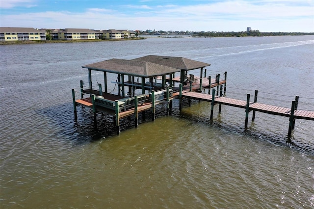 view of dock with a water view