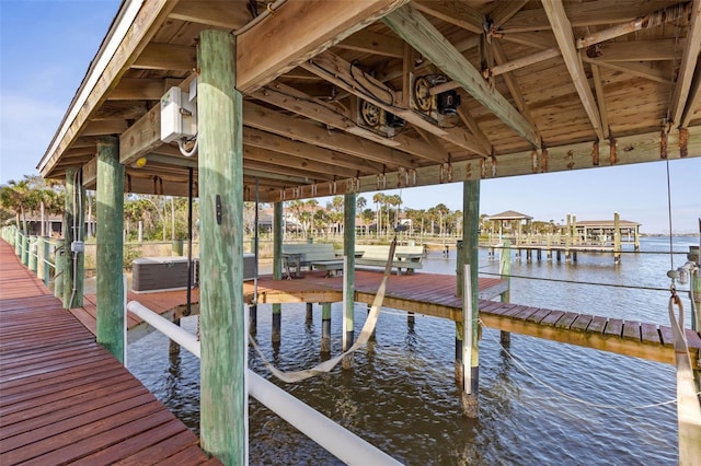 dock area featuring a water view