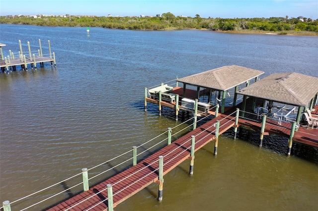 dock area featuring a water view