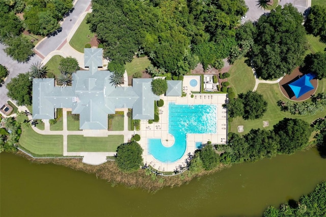 birds eye view of property with a water view