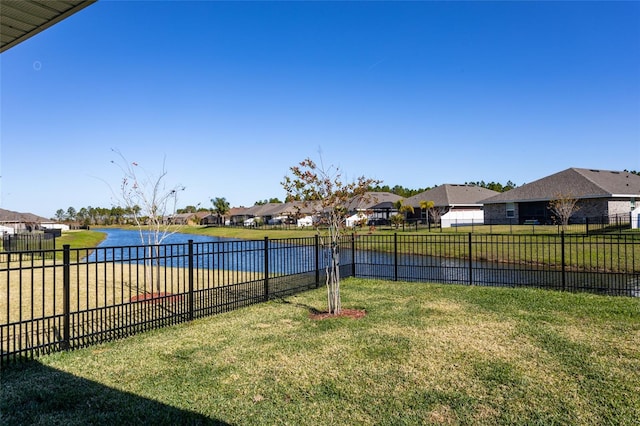 view of yard with a water view