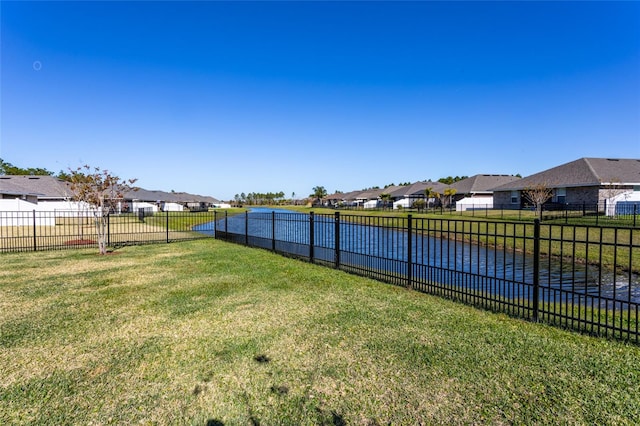 view of yard with a water view