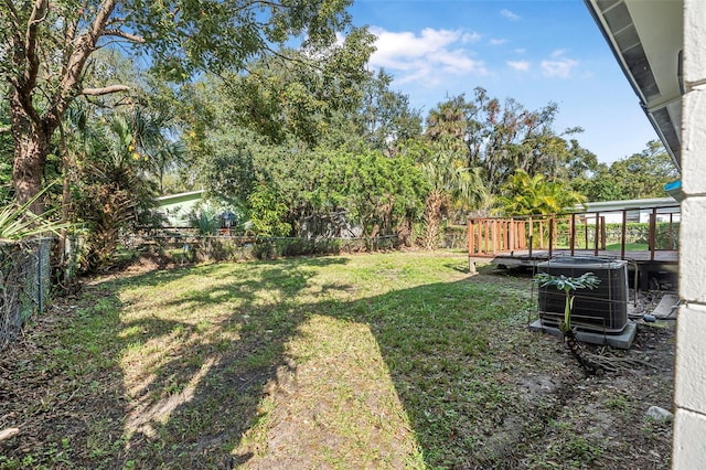 view of yard with central air condition unit