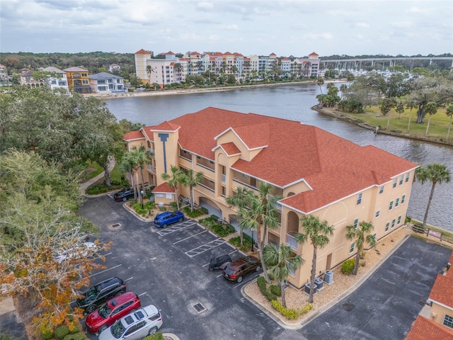 drone / aerial view with a water view