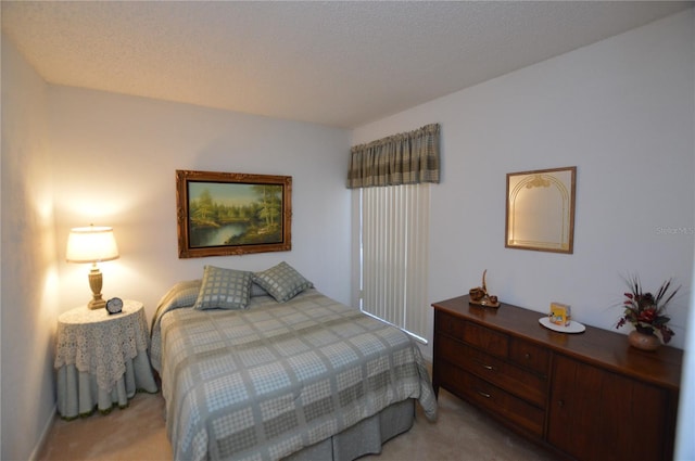 bedroom with light carpet