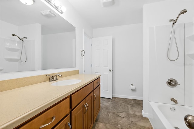 bathroom with washtub / shower combination and vanity