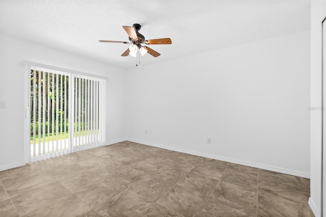 unfurnished room featuring ceiling fan