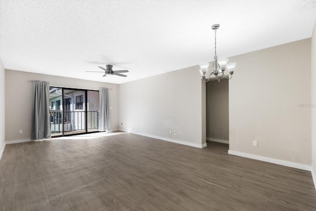 empty room featuring a textured ceiling, dark hardwood / wood-style floors, and ceiling fan with notable chandelier