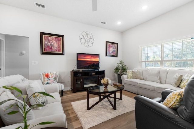 living room with dark wood-type flooring