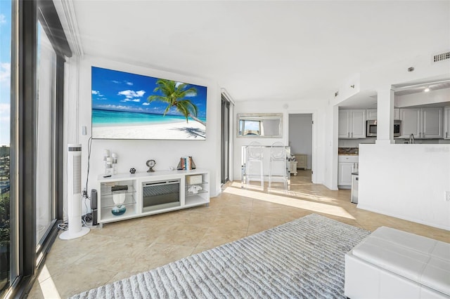 living room featuring light tile patterned floors