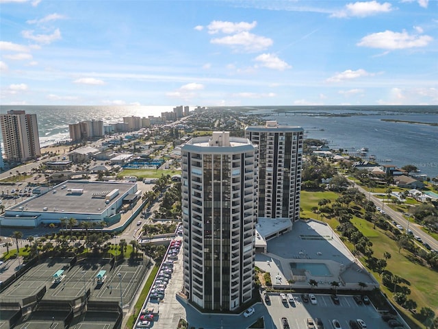 birds eye view of property with a water view