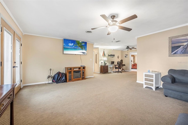 living room with ceiling fan, crown molding, and carpet floors