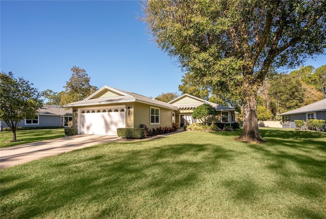 single story home with a garage and a front lawn