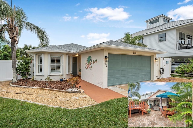 view of front of property with a garage