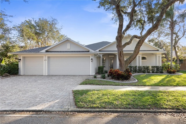 single story home featuring a garage