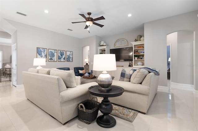 living room with ceiling fan