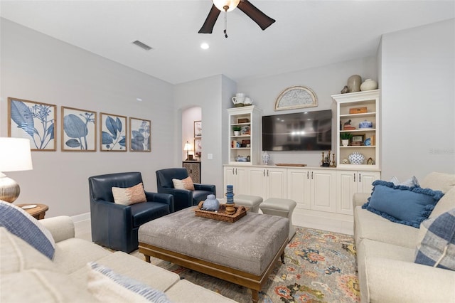 living room with ceiling fan