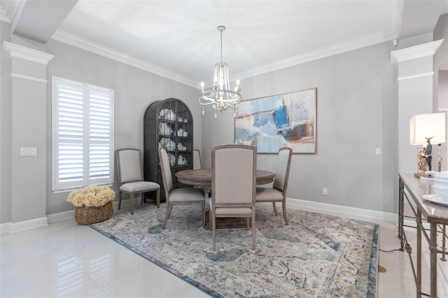 tiled dining area featuring an inviting chandelier and ornamental molding