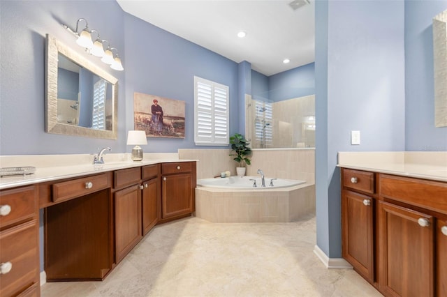 bathroom with vanity and plus walk in shower