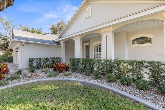 view of property exterior with a garage