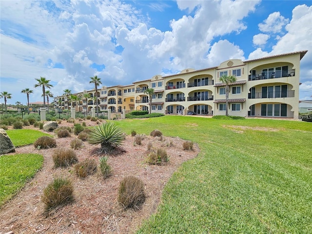 view of community featuring a lawn