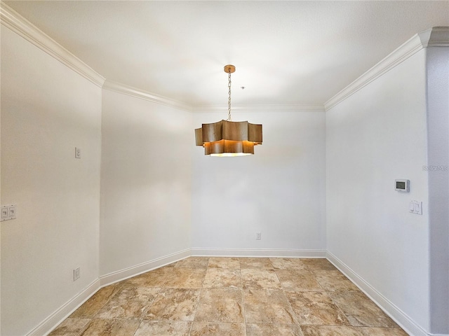 spare room with crown molding