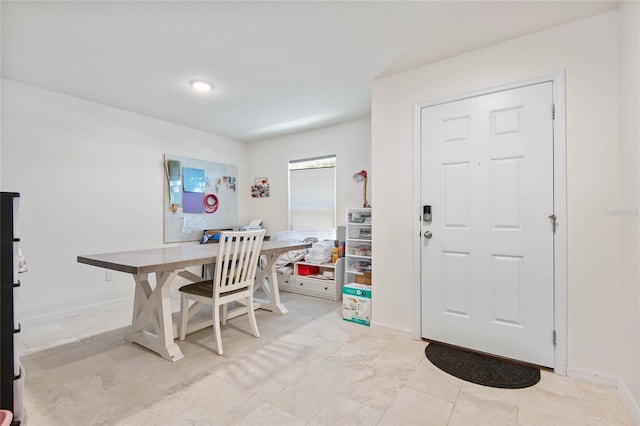 view of tiled dining space