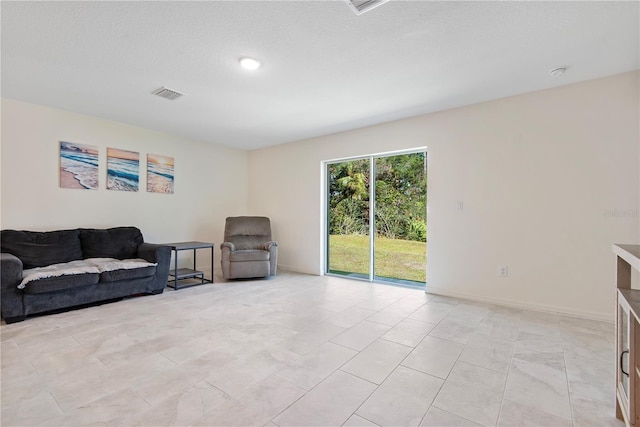 living area with light tile patterned flooring