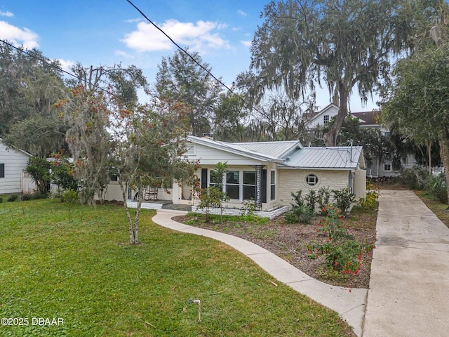 view of front of home with a front lawn