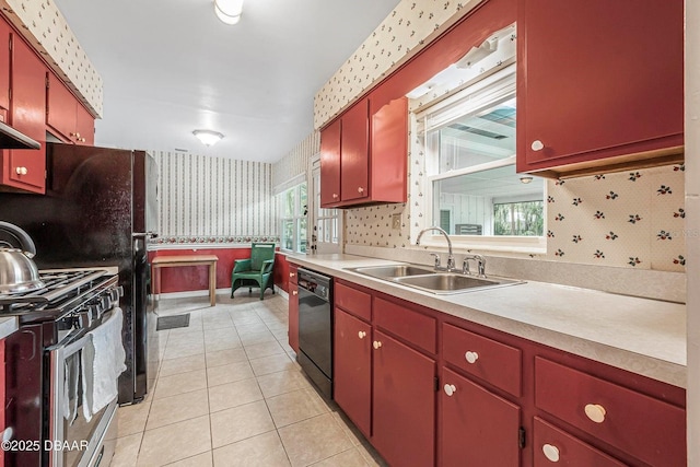 kitchen featuring dishwasher, a healthy amount of sunlight, stainless steel range with gas cooktop, and sink