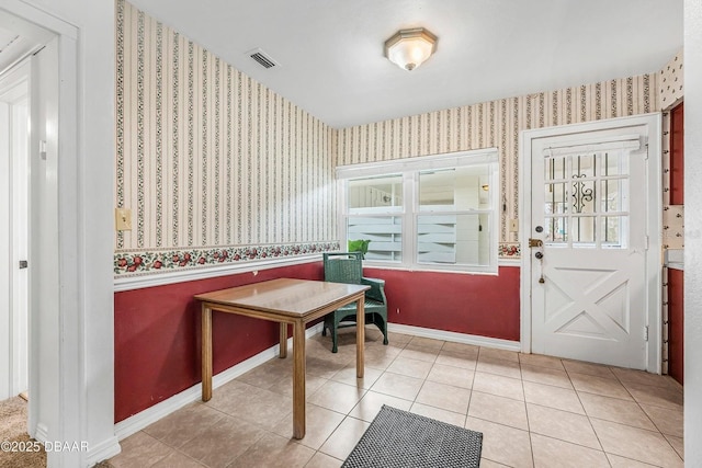 interior space featuring light tile patterned flooring