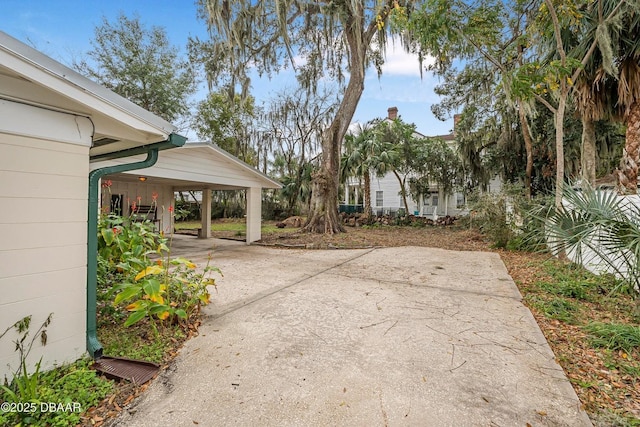 view of patio / terrace with a carport