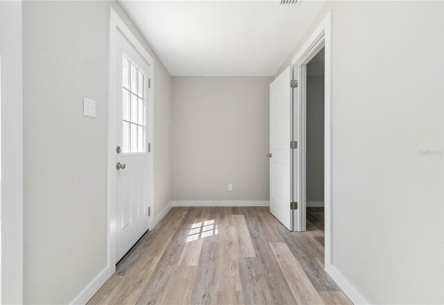 interior space with light hardwood / wood-style flooring