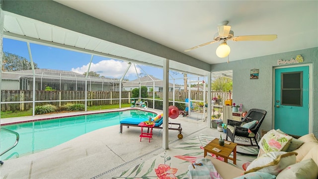 view of pool with ceiling fan