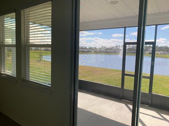 interior space featuring a water view