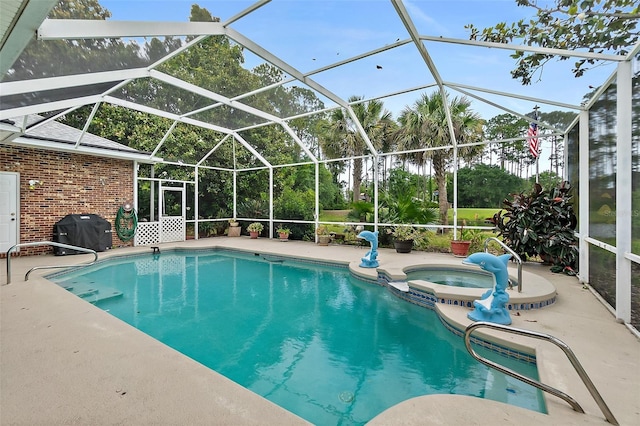 view of swimming pool featuring an in ground hot tub, a patio area, a lanai, and a grill