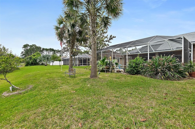 view of yard featuring a lanai