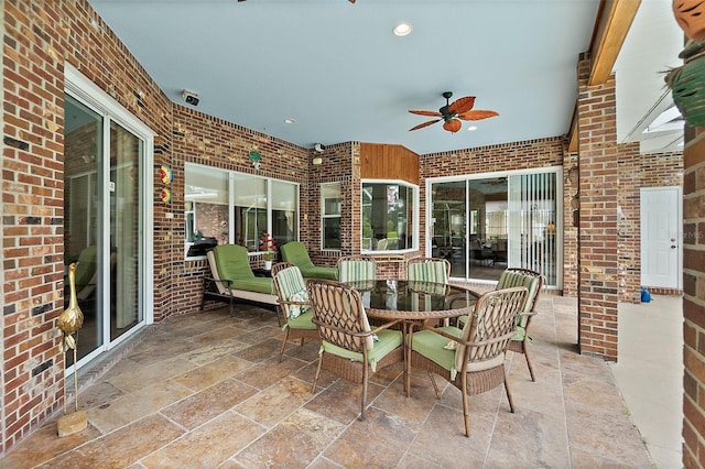 view of patio with ceiling fan