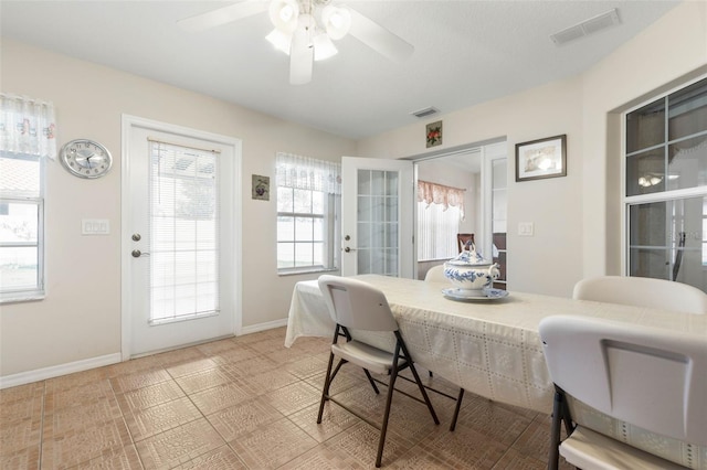 dining room with ceiling fan